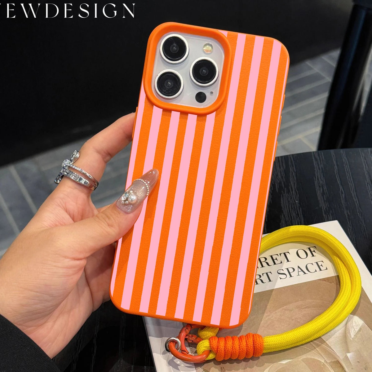 Striped iPhone case with wrist lanyard